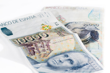 Two Spain vintage banknotes isolated on a white background with the picture of King Juan Carlos I and Jorge Juan (1713-1773). 10.000 pesetas.