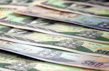 Assorted Jamaican money banknotes - Financial security concept background