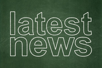 Fototapeta premium News concept: Latest News on chalkboard background