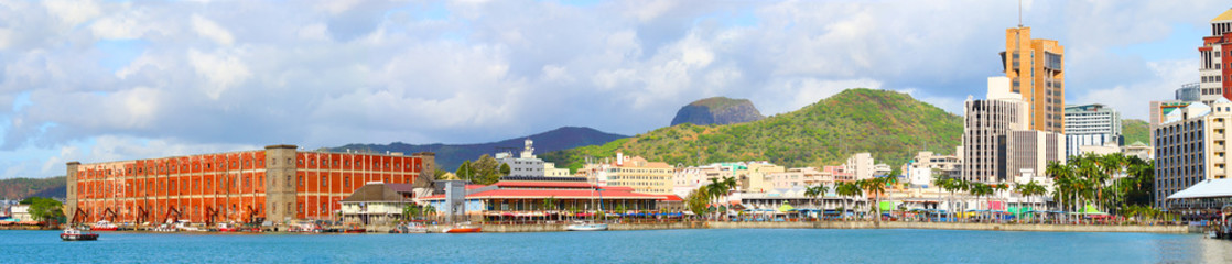 Port Louis harbor with city skyline on Mauritius Island.