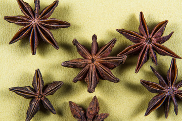 Star Anise, Illicium verum on a pale background. Close up.