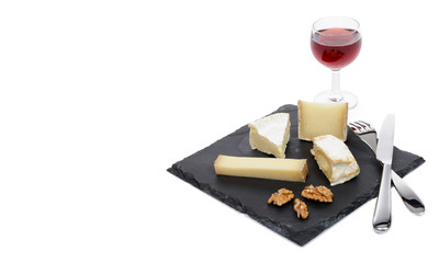 french cheese platter with a glass of red wine