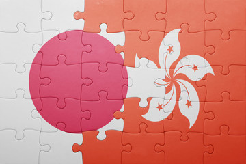 puzzle with the national flag of hong kong and  japan