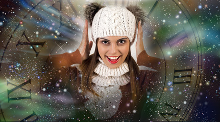 The woman with New Year's mood in ,woman happy in knitted hat 