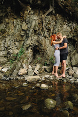 Obraz premium beautiful couple on the background of forest