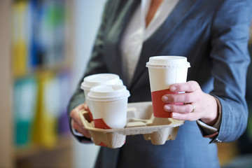 Businesswoman With Takeaway Coffee