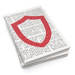 Protection concept: Contoured Shield on Newspaper background