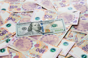 US dollar and Argentine peso bills