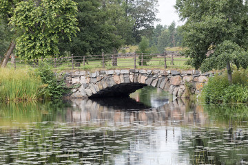 Fototapeta na wymiar Beautiful bridge made of stone