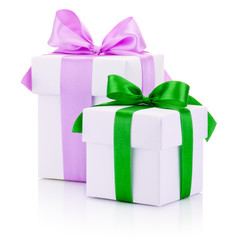 Two white gift boxs tied pink and green ribbons bow Isolated on