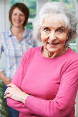 Senior Woman With Adult Daughter At Home