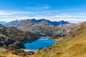 Fototapeta na wymiar Stunning view of Engstlensee lake and the Alps