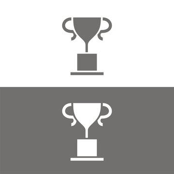 Icono de un trofeo cl&aacute;sico sobre fondos blanco y negro