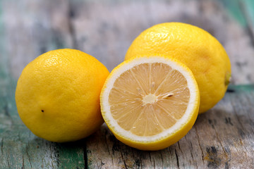 Fresh lemons on wooden table
