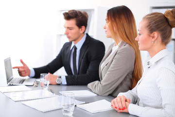 Fototapeta premium Group of Business people at meeting, focus on blond business woman