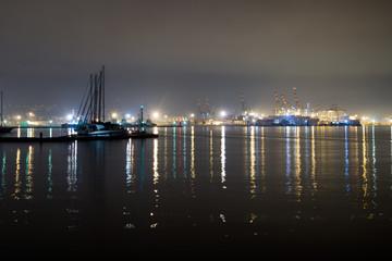 Fototapeta na wymiar Wide angle view of docks, La Spezia, Italy. Night.