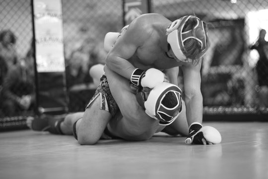 MMA fighter controlling his opponent in clinch