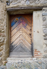 old brown door of a medieval house