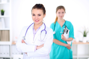 Portrait of young female  doctor in a hospital