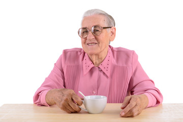 old woman andcup of tea