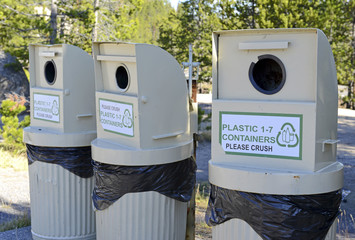 Bear proof trash bins in camping area in Yellowstone National Park, vital to help prevent animal...