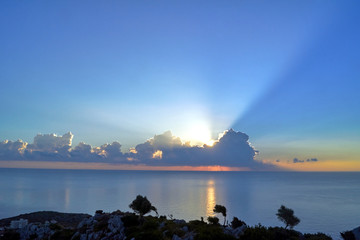 Naklejka na ściany i meble Sunrise over the Mediterranean Sea on the island of Rhodes .