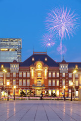 Fototapeta na wymiar Tokyo train station building and beautiful firework