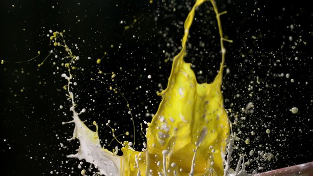 Paint splash in the air shooting with high speed camera.