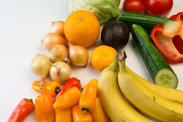 Fruits and vegetables on a white background.