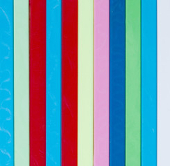 Colorful striped background. Plastique sticks of different color