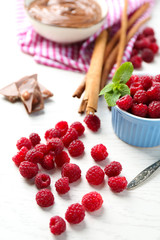 Beautiful composition with chocolate cream and raspberries
