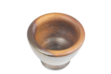 Mortar and pestle made of clay isolate on white
