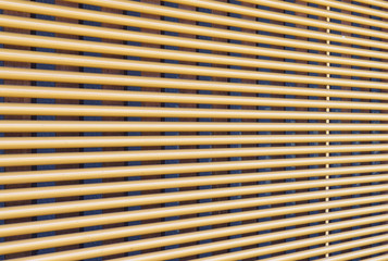 Perspective of Window wooden blind clos - up