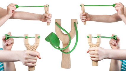 set of female hands with wooden slingshot - obrazy, fototapety, plakaty