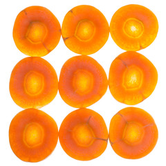 several fresh sliced carrots isolated on white