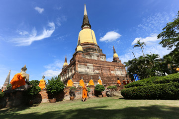 Fototapeta na wymiar Monk and Buddha statue