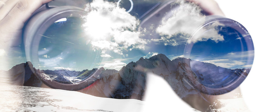 Double exposure of binoculars and mountainscape letterbox