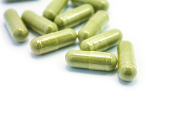 Herbal Drug, an alternative medicine in capsule on white backgro