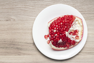 One part of the garnet on the white plate.