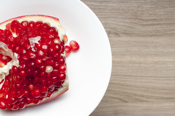 One part of the garnet on the white plate.