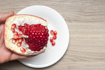 One part of the garnet on the white plate.