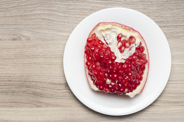 One part of the garnet on the white plate.