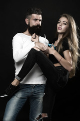 Man and woman with scissors