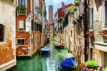 Fototapeta na wymiar The Rio di San Cassiano Canal with boats, Venice, Italy
