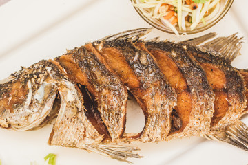 Fried fish Thai food on plate
