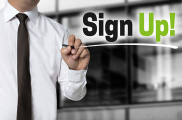 sign up is written by businessman background concept