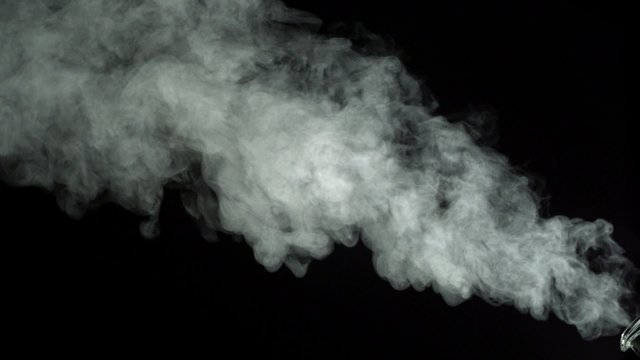 Boiling water in kettle on black background shooting with high speed camera, phantom flex.