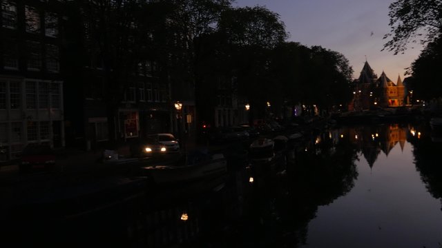 Nieuwmarkt and the Waag on the Kloveniersburgwal Canal in Amsterdam. Taken in 4K during the predawn