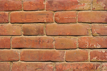 Obraz premium Old red brick wall close-up