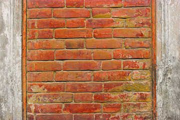 Weathered red brick feame for inscriptions